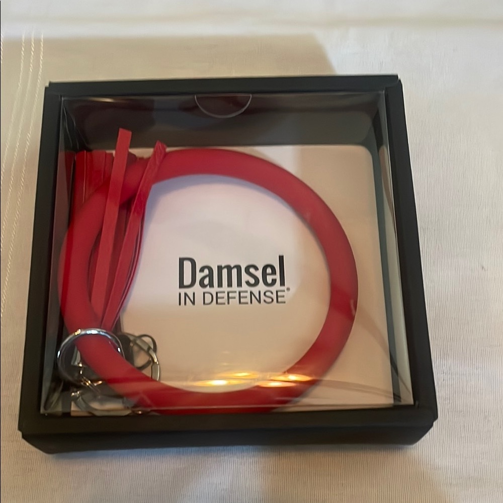 Damsel in Defense Red Arm Candy Keychain